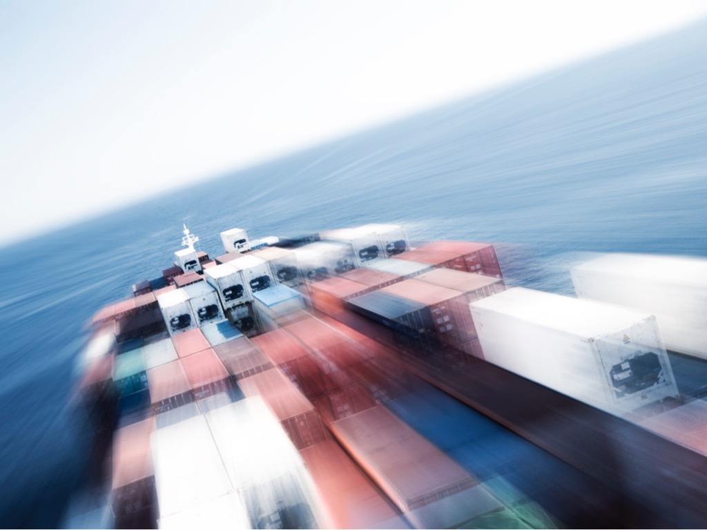 large-container-vessel-ship-and-the-horizon-motion-blur-picture-id480006188
